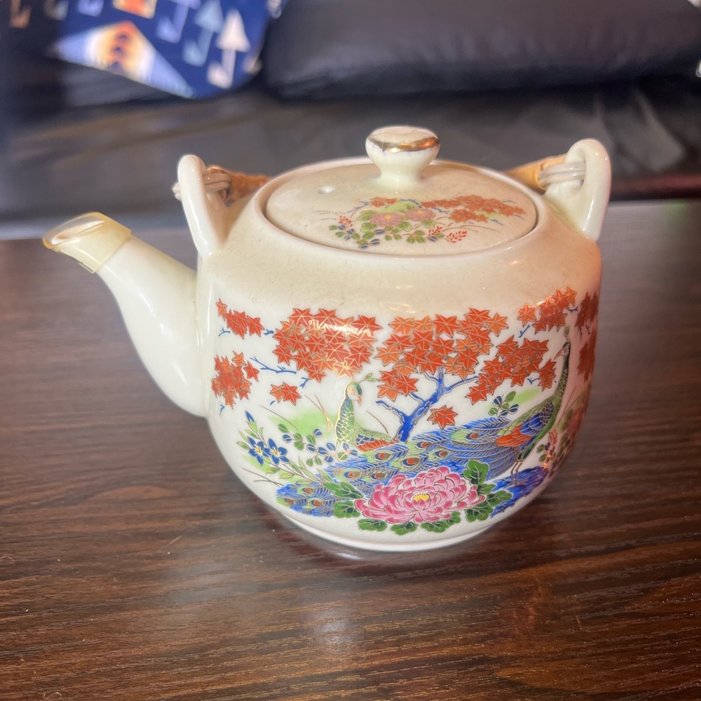 Vintage Japanese tea pot with a peacock